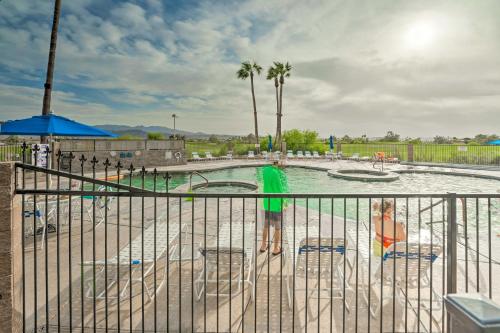 a water park with a pool with two slides at Walk to Beach Lake Havasu Condo with Pool Access in Lake Havasu City