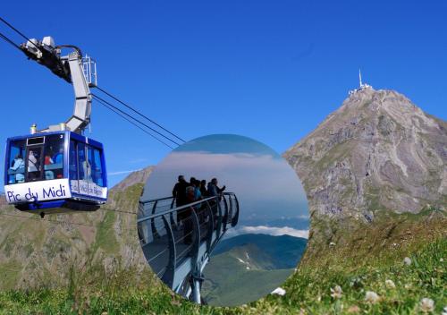 a gondola ride in the mountains with people on it at Hôtel Croix des Bretons - Lourdes Pyrénées in Lourdes