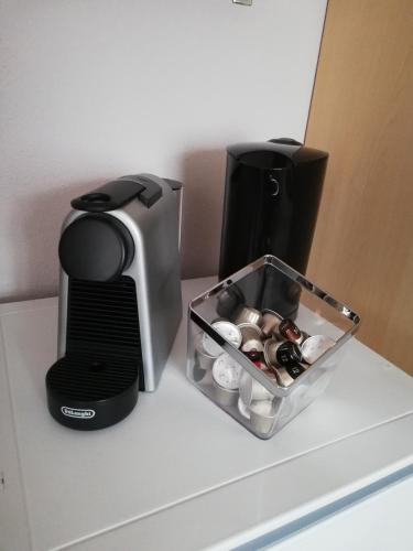a toaster and a coffee maker on a counter at Haus Höll Herta in Hallstatt