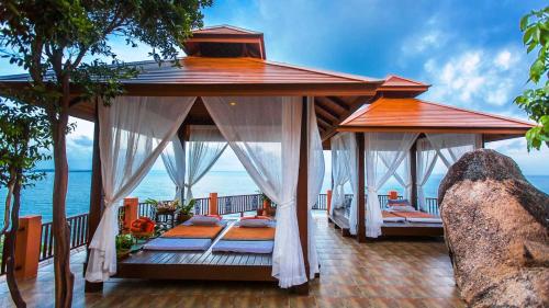 Postel nebo postele na pokoji v ubytování Samui Bayview Resort & Spa - SHA Plus