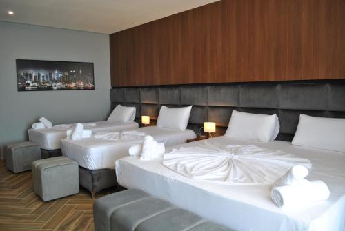 Cama o camas de una habitación en Twin Towers Hotel City & Beach Resort