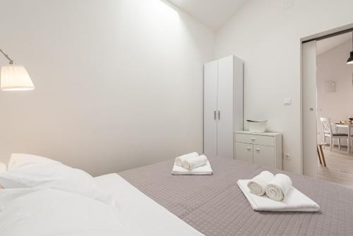 Ένα ή περισσότερα κρεβάτια σε δωμάτιο στο Apartmani Opg Dragoslavić