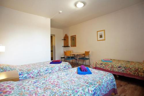 Postel nebo postele na pokoji v ubytování Jägerhof
