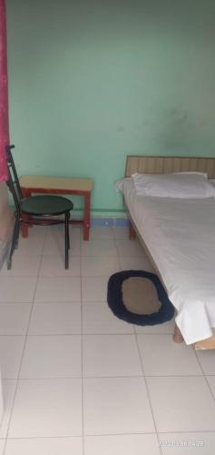 Postel nebo postele na pokoji v ubytování Vamoose Golok