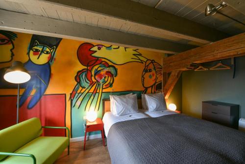 Postel nebo postele na pokoji v ubytování Hotel De Gravin