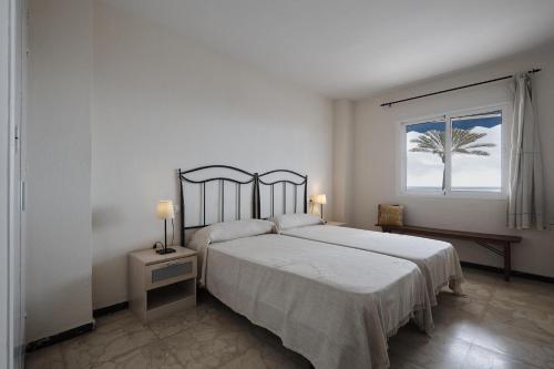 Postel nebo postele na pokoji v ubytování Apartamento Boliches