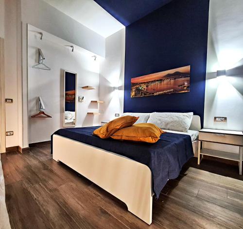 Säng eller sängar i ett rum på City Focus Apartments Napoli