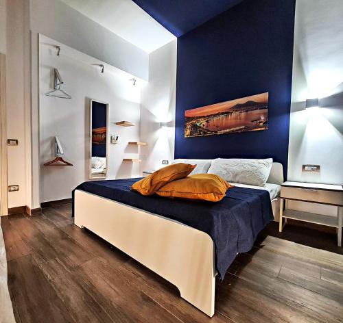 A bed or beds in a room at City Focus Apartments Napoli