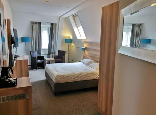 Postel nebo postele na pokoji v ubytování Best Western Hotel Baars