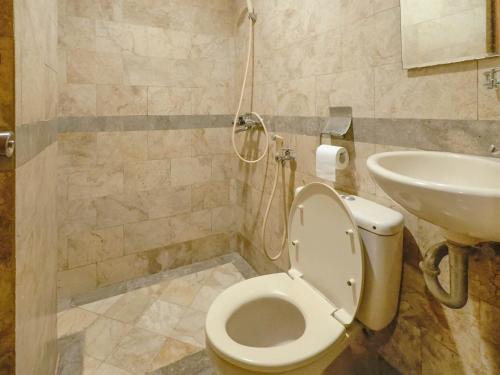 Ένα μπάνιο στο Rhiz Guest House Tebet