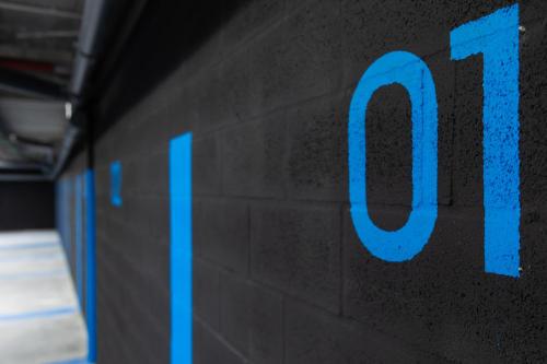 a wall with the number on it at Ibis Budget Bilbao City in Bilbao
