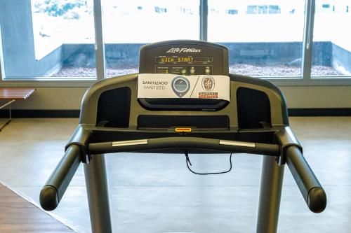 a gym seat with a scale on top of it at Novotel São Paulo Berrini in Sao Paulo