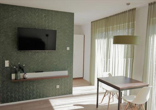 Televisyen dan/atau pusat hiburan di Apartments U37