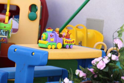 a toy train sitting on top of a table at Yacht Marina Hotel in Pantelleria