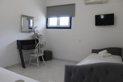 Ένα ή περισσότερα κρεβάτια σε δωμάτιο στο Sofia Apartments