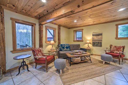 A seating area at Quiet Saranac Lake Cabin with Deck Pets Welcome!