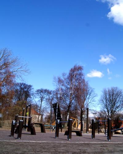 a park with a bunch of playground equipment at Hotel 1622 - Spa, Hotell & Konferens in Helsingborg