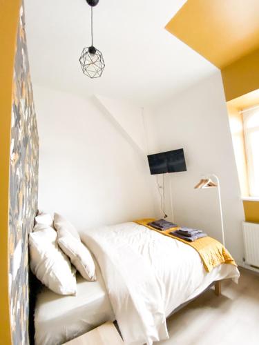 Voodi või voodid majutusasutuse Capstay Roubaix Lille private shower & Netflix toas