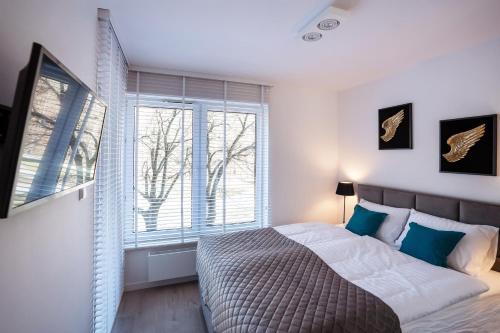 Un pat sau paturi într-o cameră la Apartament Sedina D211 Nadmorskie Tarasy