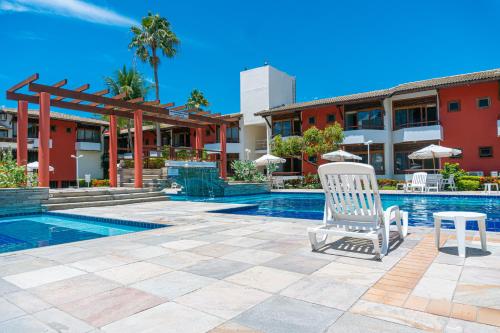 Porto das Naus Praia Hotel tesisinde veya buraya yakın yüzme havuzu