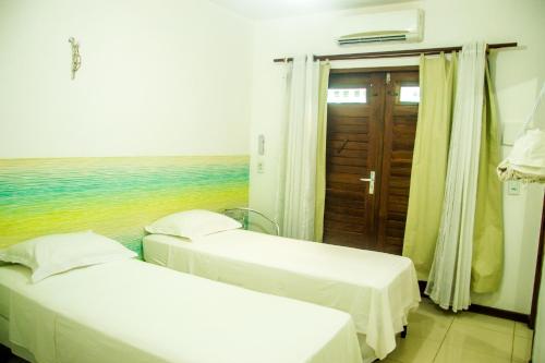 Una cama o camas en una habitación de A casa é sua!