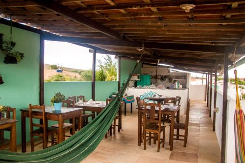 Un restaurante u otro lugar para comer en A casa é sua!