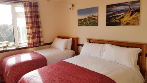 Postel nebo postele na pokoji v ubytování Moorside Rooms