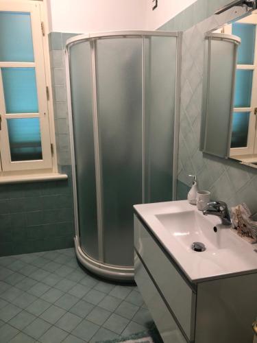 a bathroom with a shower and a sink at Acquamarina in Forte dei Marmi
