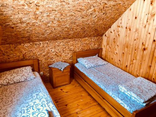 Postel nebo postele na pokoji v ubytování Cottage Uskoci