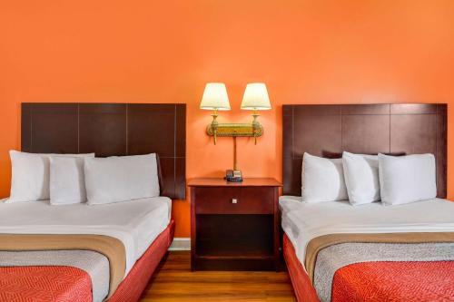 Ένα ή περισσότερα κρεβάτια σε δωμάτιο στο Motel 6-Americus, GA