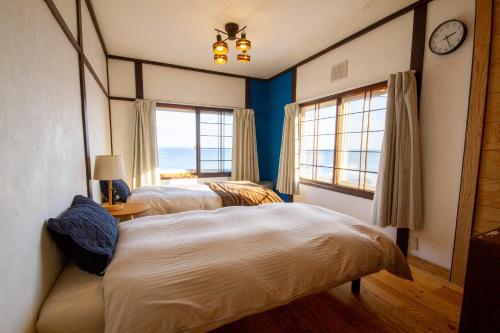Voodi või voodid majutusasutuse kODATEL コダテル函館シーサイド2 toas