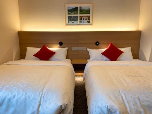 Postel nebo postele na pokoji v ubytování Hotel Bijiko