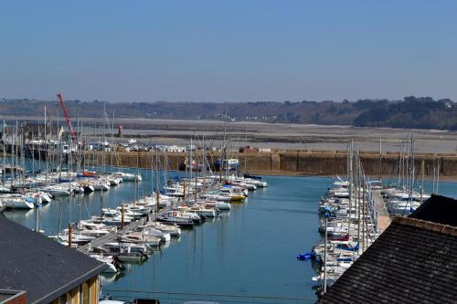 a bunch of boats are docked in a marina at Au Bon Accueil in Perros-Guirec