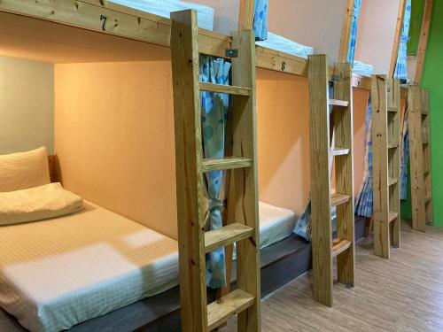 Postel nebo postele na pokoji v ubytování 綠蠵龜潛水住宿