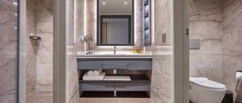 Kylpyhuone majoituspaikassa Mylome Luxury Hotel & Resort - Ultra All Inclusive
