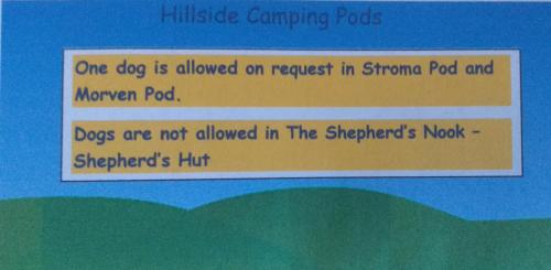 a picture of a sign that says dog is allowed on request in shrimppod at Hillside Camping Pods and Shepherd's Hut in Wick