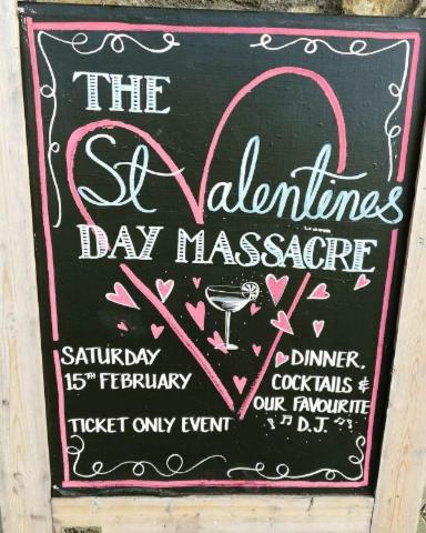 a sign for the st valentines day massacreemetery at The Plume of Feathers in Sherborne