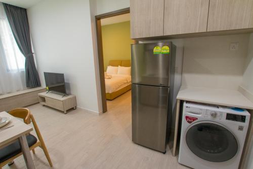 Dapur atau dapur kecil di Cantonment Serviced Apartment