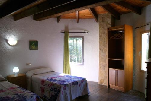 A bed or beds in a room at Villa Efaistos