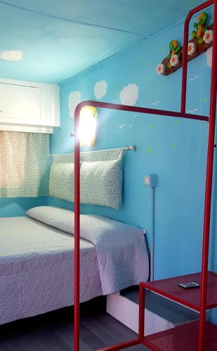 Postel nebo postele na pokoji v ubytování New Camping Coccorrocci