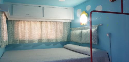 Postel nebo postele na pokoji v ubytování New Camping Coccorrocci