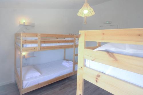 Ένα ή περισσότερα κρεβάτια σε δωμάτιο στο Hostel Retiro do Gerês