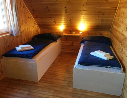 Postel nebo postele na pokoji v ubytování Chata Thurmberg