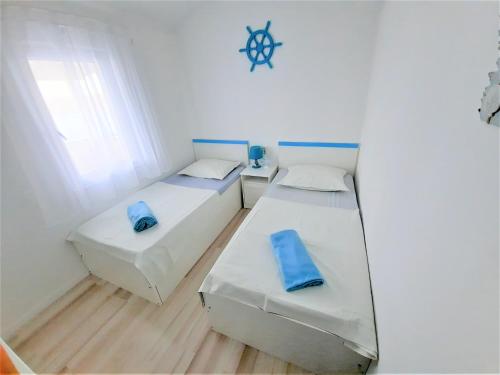 Postel nebo postele na pokoji v ubytování Summer House Hacienda, Pag - Miškovići