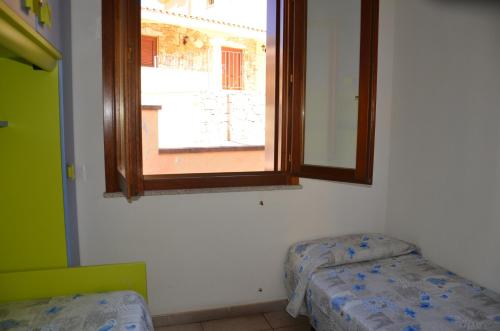 Gallery image of Villetta con giardino in contesto riservato non lontana dal mare BEL01 in Agrustos
