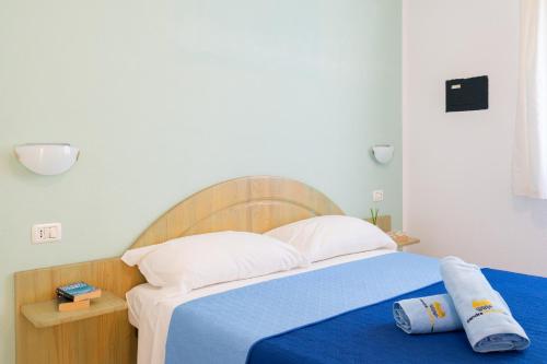 Cama o camas de una habitación en Residence PendraSardinia Costa del Turchese by PendraHolidays