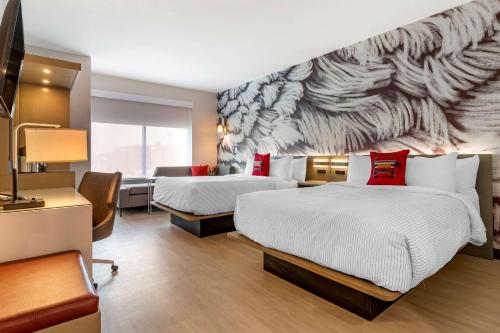 Кровать или кровати в номере Cambria Hotel Rock Hill - University Center