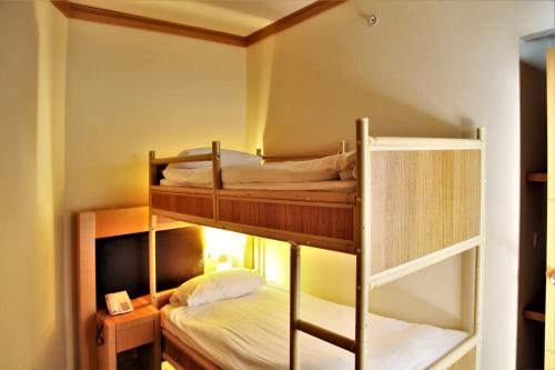 Postel nebo postele na pokoji v ubytování Adrina Termal Health & SPA Hotel