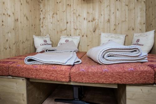 A bed or beds in a room at Camping Sass Dlacia