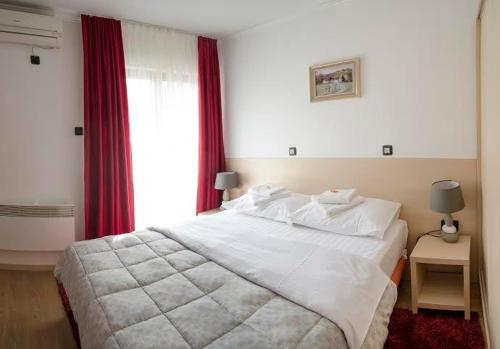 Кровать или кровати в номере Hotel Viv